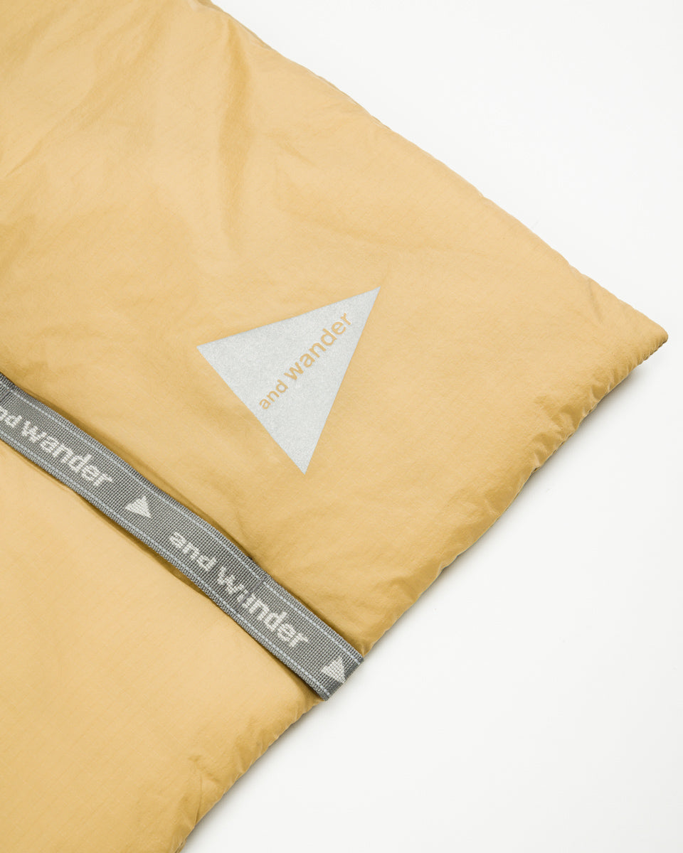 And Wander PRIMALOFT rip muffler - Beige - Standard & Strange