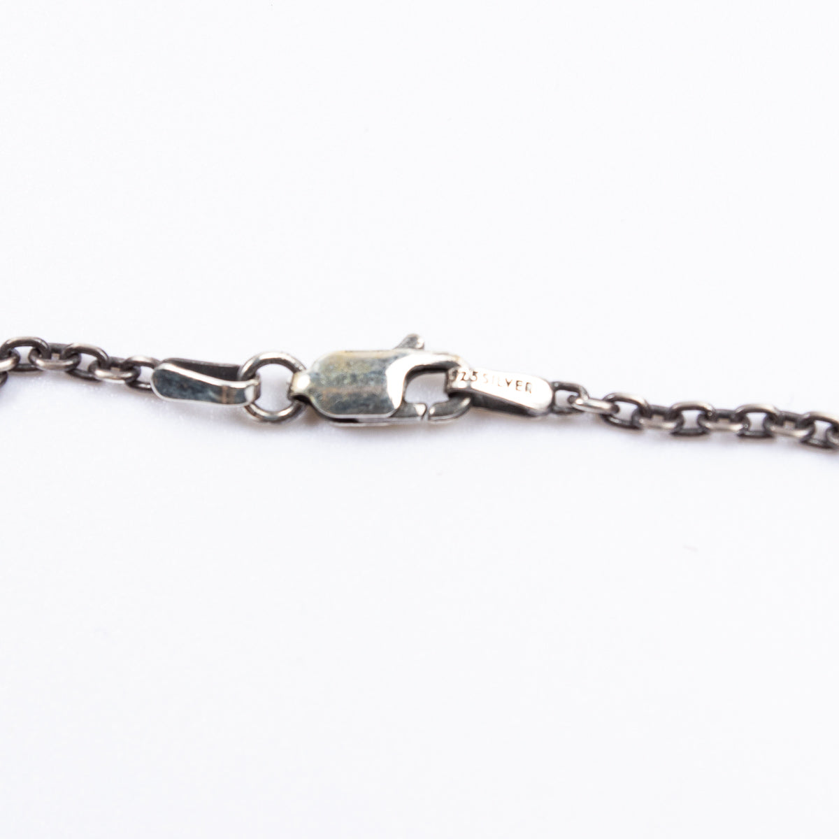 Black Sign Poison in the Brain Charm - Standard & Strange