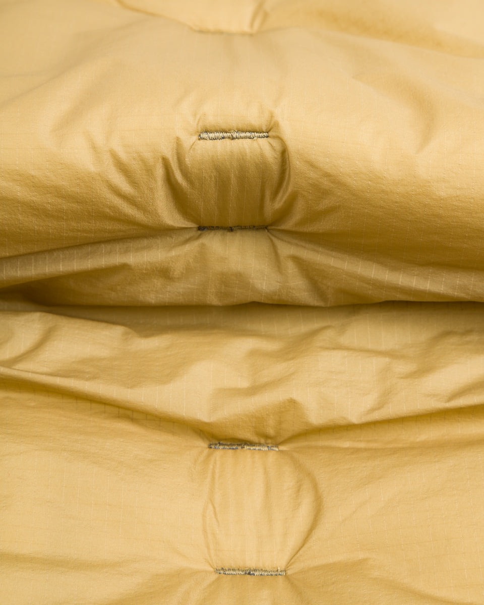 And Wander PRIMALOFT rip muffler - Beige - Standard & Strange