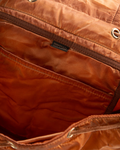 PORTER - Yoshida & Co Luggage Label OldNew Rucksack - Kakishibu - Standard & Strange